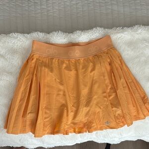 ALO Yoga aces sport skort, golden orange